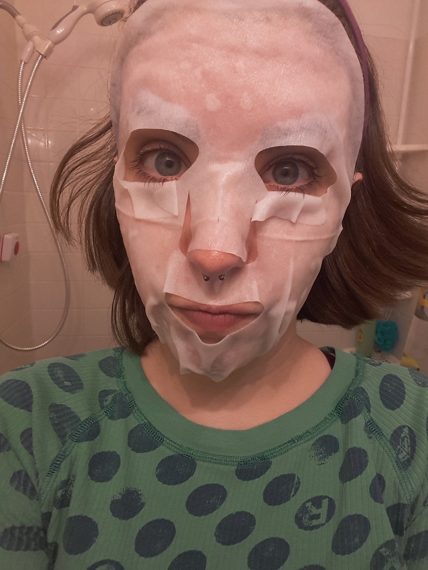 An unflattering picture of me wearing the Dermal Korea sheet mask.